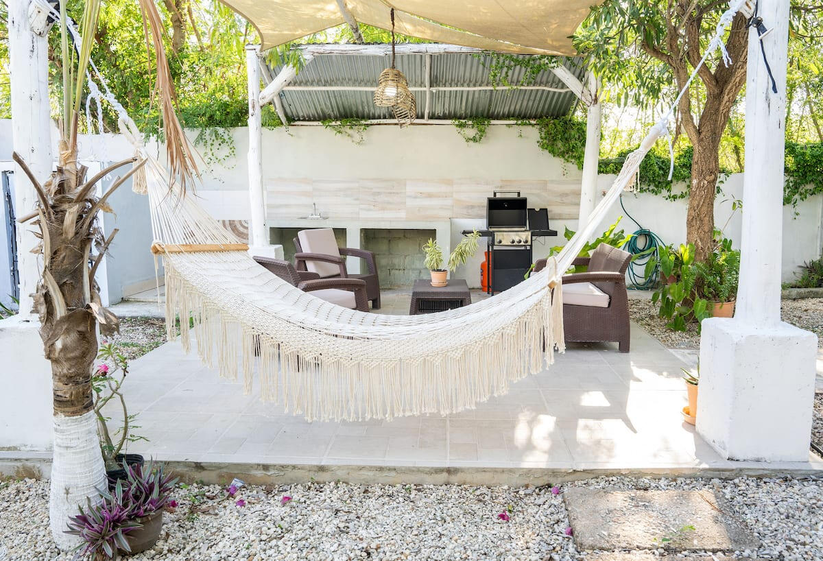 Apartamento jardín con pérgola, hamaca y BBQ